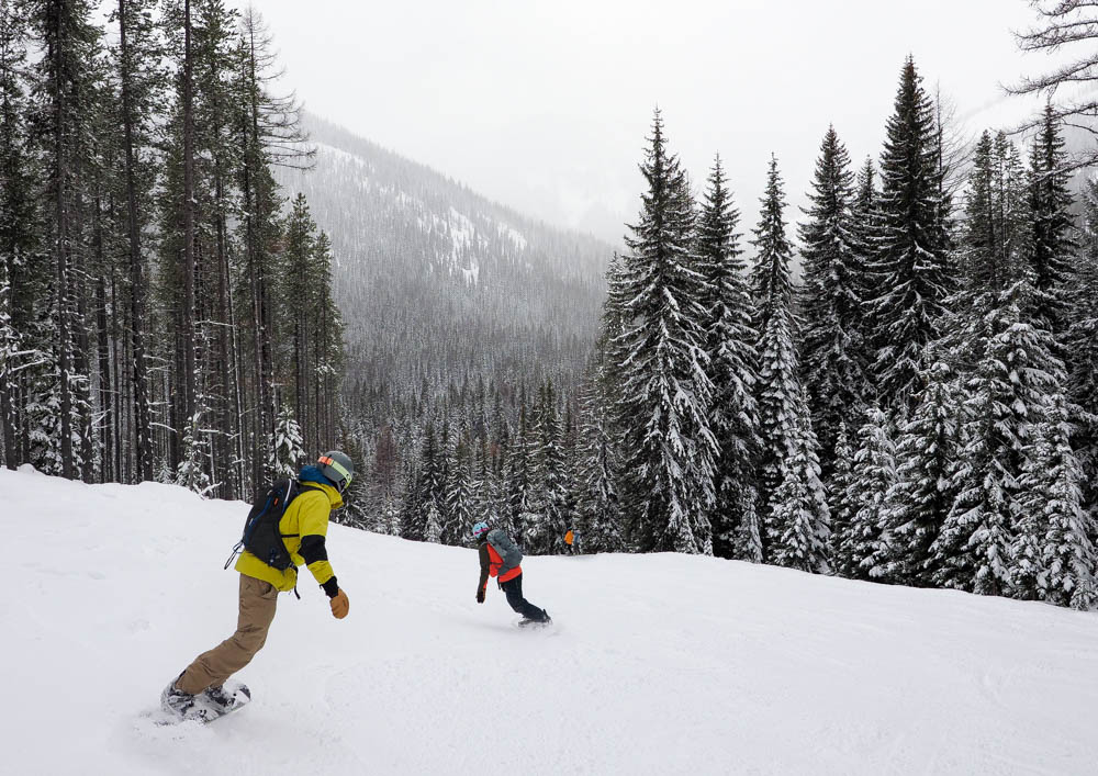 Alex Silgalis and Jaime Pirozzi ride their snowboards down a run at Lookout Pass in Idaho. Pam LeBlanc photo