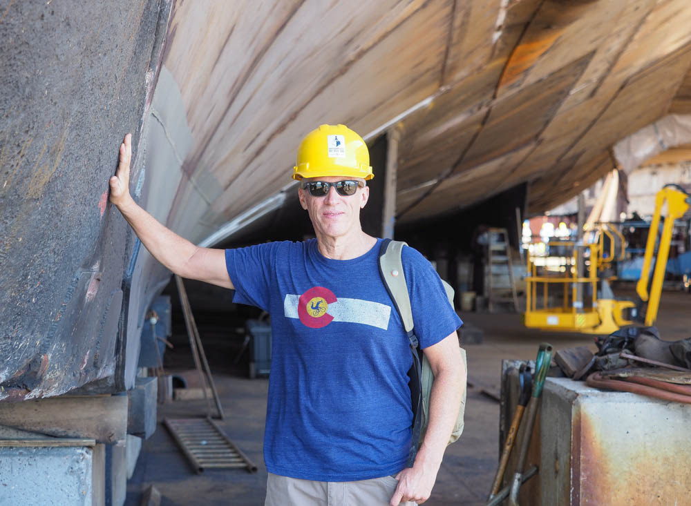 Chris LeBlanc leans against the keel of the Battleship Texas, now in dry dock in Galveston. Pam LeBlanc photo